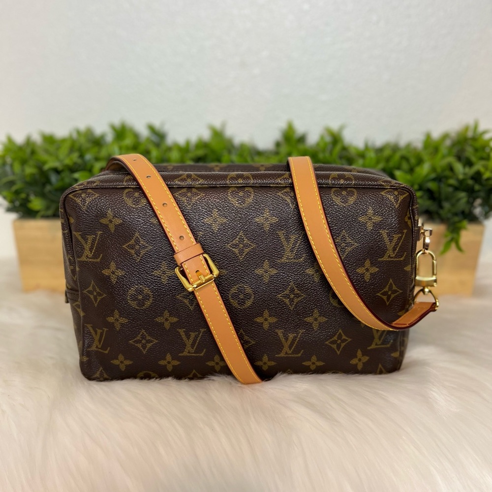 Authentic Louis Vuitton Trousse 28 converted into crossbody with Generic strap.